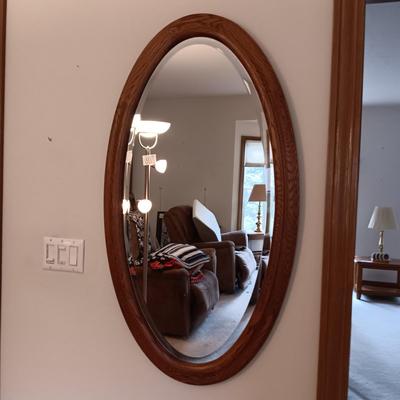 BEVELED OVAL WALL MIRROR WITH WOODEN FRAME