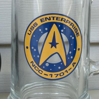 LOT 14P: Star Trek Collectibles - 1997 Calendar, U.S.S. Enterprise NCC-1701 Pizza Cutter & More