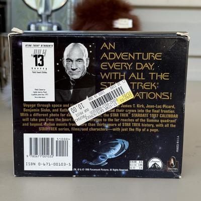 LOT 14P: Star Trek Collectibles - 1997 Calendar, U.S.S. Enterprise NCC-1701 Pizza Cutter & More