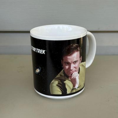 LOT 14P: Star Trek Collectibles - 1997 Calendar, U.S.S. Enterprise NCC-1701 Pizza Cutter & More