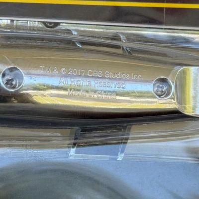 LOT 14P: Star Trek Collectibles - 1997 Calendar, U.S.S. Enterprise NCC-1701 Pizza Cutter & More