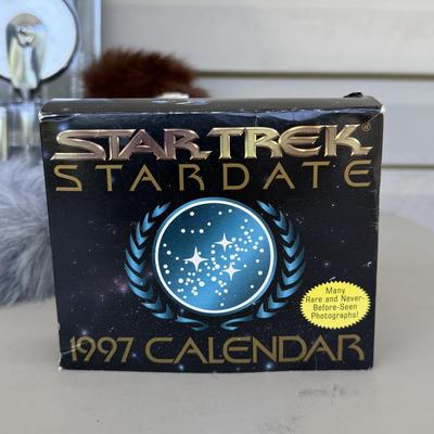 LOT 14P: Star Trek Collectibles - 1997 Calendar, U.S.S. Enterprise NCC-1701 Pizza Cutter & More