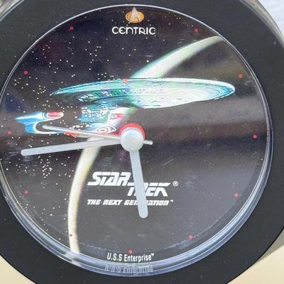 LOT 14P: Star Trek Collectibles - 1997 Calendar, U.S.S. Enterprise NCC-1701 Pizza Cutter & More