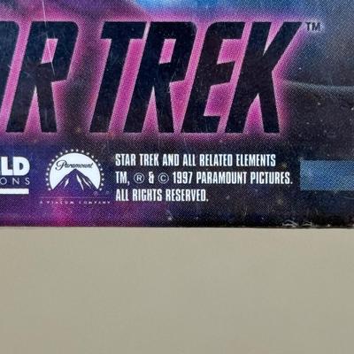 LOT 14P: Star Trek Collectibles - 1997 Calendar, U.S.S. Enterprise NCC-1701 Pizza Cutter & More