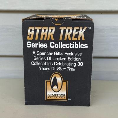 LOT 14P: Star Trek Collectibles - 1997 Calendar, U.S.S. Enterprise NCC-1701 Pizza Cutter & More