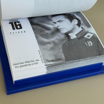 LOT 14P: Star Trek Collectibles - 1997 Calendar, U.S.S. Enterprise NCC-1701 Pizza Cutter & More