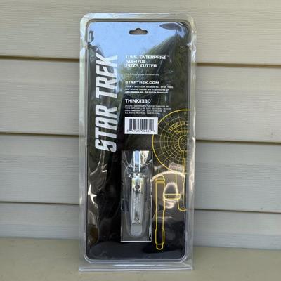 LOT 14P: Star Trek Collectibles - 1997 Calendar, U.S.S. Enterprise NCC-1701 Pizza Cutter & More