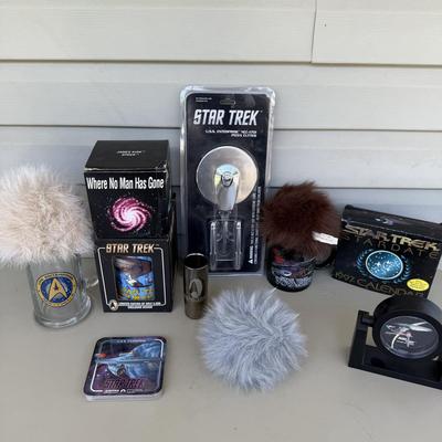 LOT 14P: Star Trek Collectibles - 1997 Calendar, U.S.S. Enterprise NCC-1701 Pizza Cutter & More