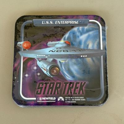 LOT 14P: Star Trek Collectibles - 1997 Calendar, U.S.S. Enterprise NCC-1701 Pizza Cutter & More
