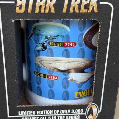 LOT 14P: Star Trek Collectibles - 1997 Calendar, U.S.S. Enterprise NCC-1701 Pizza Cutter & More
