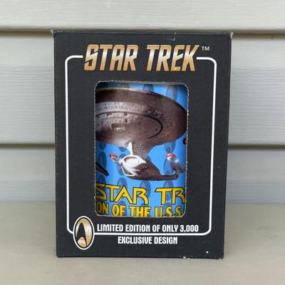 LOT 14P: Star Trek Collectibles - 1997 Calendar, U.S.S. Enterprise NCC-1701 Pizza Cutter & More
