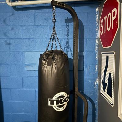 LOT 86: TKO Commercial Heavy Bag Stand w/ TKO 100lb Pro Style Heavy Bag