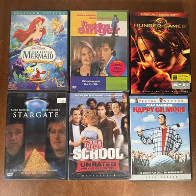 LOT 97B: GPX Portable DVD Player Model PD808 w/ DVD Collection