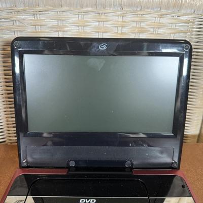 LOT 97B: GPX Portable DVD Player Model PD808 w/ DVD Collection