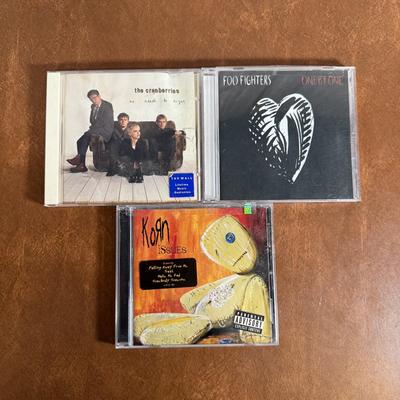 LOT 99B: Large CD & 45 Records - Korn, 50 Cent, Nirvana & More!