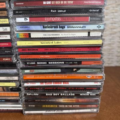 LOT 99B: Large CD & 45 Records - Korn, 50 Cent, Nirvana & More!