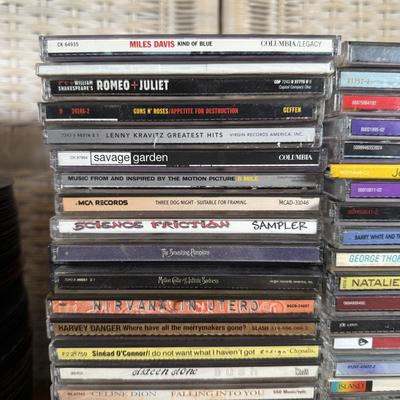 LOT 99B: Large CD & 45 Records - Korn, 50 Cent, Nirvana & More!