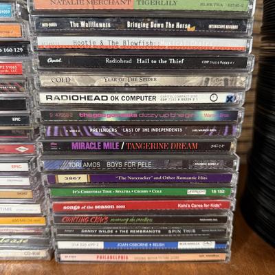LOT 99B: Large CD & 45 Records - Korn, 50 Cent, Nirvana & More!