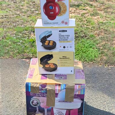 LOT 103G: Nostalgia Cotton Candy NRPCM45RR, Bella Mini Cake Pop Maker GH-6201P, Mini Donut Maker GH-GH-6201D, Dash Mini Pizzelle Maker...