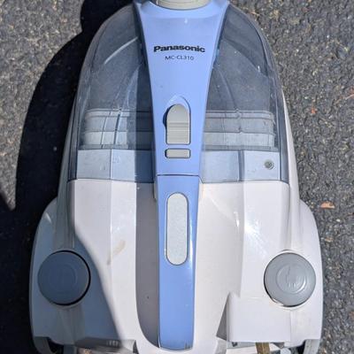 LOT 108G: Panasonice Canister Vacuum Model: MC-CL310 02, Elezon Stick Vacuum Model: # E600, Impress GoVac Model: IM-1002B, 1003R &...