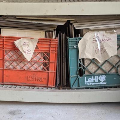LOT 109G: Large Assortment of Porcelain Tiles 12 X 12 & Open Containers of Tile Adhesive