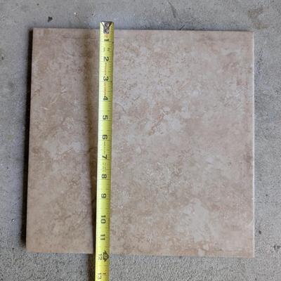 LOT 109G: Large Assortment of Porcelain Tiles 12 X 12 & Open Containers of Tile Adhesive