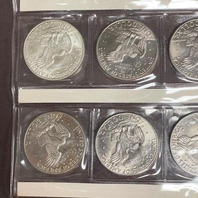Two Eisenhower Dollar Coin Books (ST-SS)