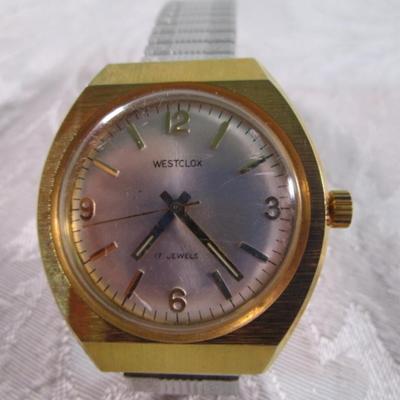 Westclox watch, 17 jewels, gold tone, Model FE-140. Works