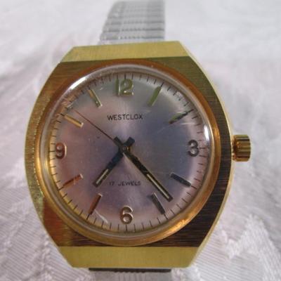 Westclox watch, 17 jewels, gold tone, Model FE-140. Works