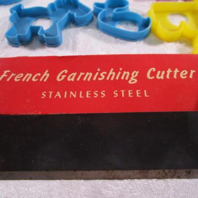 15 small Cookie cutters, birthday candle holders, nut cups, garnish cutter, glass tumbler