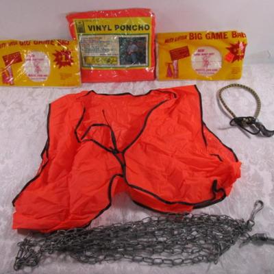 2 Big game bags, new Vinyl Poncho, vinyl vest, 15' dog chain, bungie cord