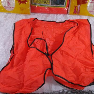 2 Big game bags, new Vinyl Poncho, vinyl vest, 15' dog chain, bungie cord