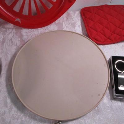 Lazy Susan, 2 paper plate holders, bowl, nutcrackers, mop head, hot pad, keychain