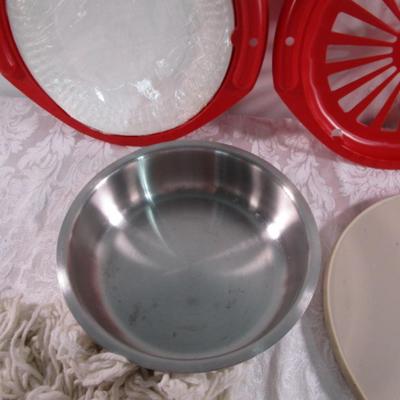 Lazy Susan, 2 paper plate holders, bowl, nutcrackers, mop head, hot pad, keychain
