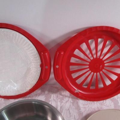 Lazy Susan, 2 paper plate holders, bowl, nutcrackers, mop head, hot pad, keychain
