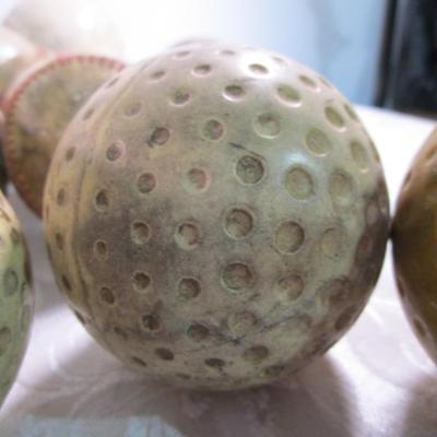 3 Vintage large dimpled golf balls, 3" tall