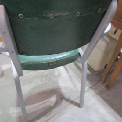 Vintage upholstered Cramer Airflow metal chair