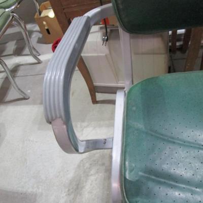 Vintage upholstered Cramer Airflow metal chair