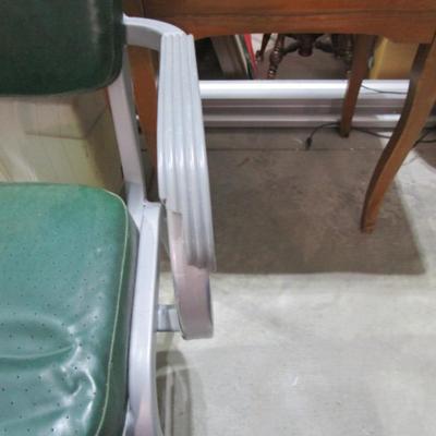 Vintage upholstered Cramer Airflow metal chair