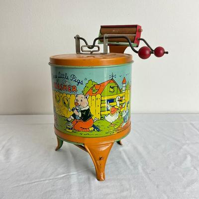D877 Vintage "Three Little Pigs" Washer By J. Chein & Co.