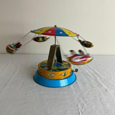 D878 Vintage Children's Carousel Tin Toy