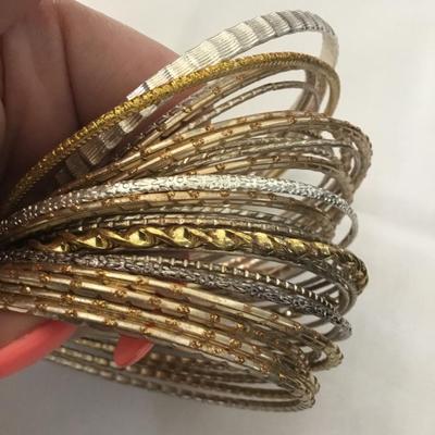 Gold and silver toned metal bangle, bracelets