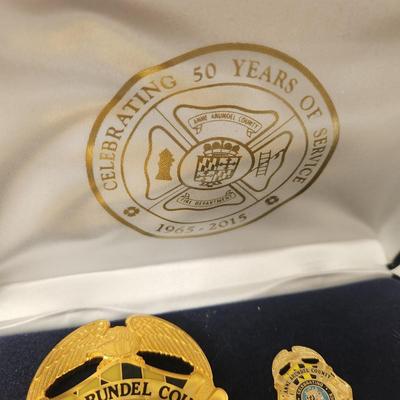 Collection of Anne Arundel County Fire Department Badges 50 Years of Service