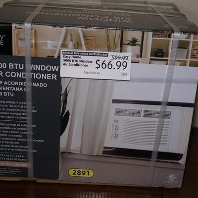 NIB 5000BTU WINDOW AIR CONDITIONER. - NEVER OPENED.