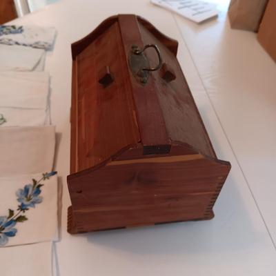 A WIDE VARIETY OF HANKIES AND A SMALL WOODEN SEWING BOX