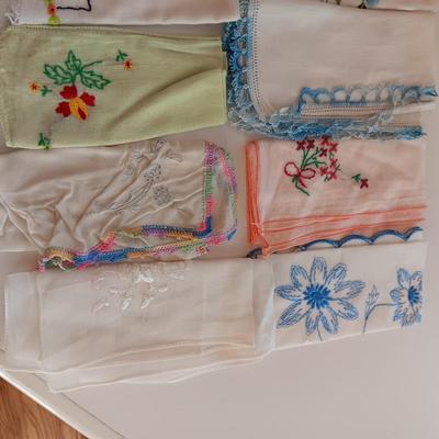 A WIDE VARIETY OF HANKIES AND A SMALL WOODEN SEWING BOX