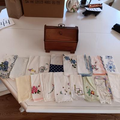 A WIDE VARIETY OF HANKIES AND A SMALL WOODEN SEWING BOX