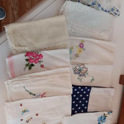 A WIDE VARIETY OF HANKIES AND A SMALL WOODEN SEWING BOX
