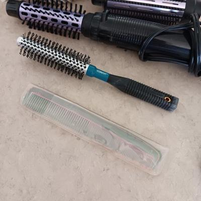 HAIR CARE ITEMS AND A SMALL ELECTRIC RAZOR