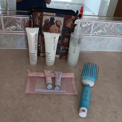 MARY KAY SATIN HANDS AND SOME SAMPLES PLUS A MAKEUP BAG AND BRUSH